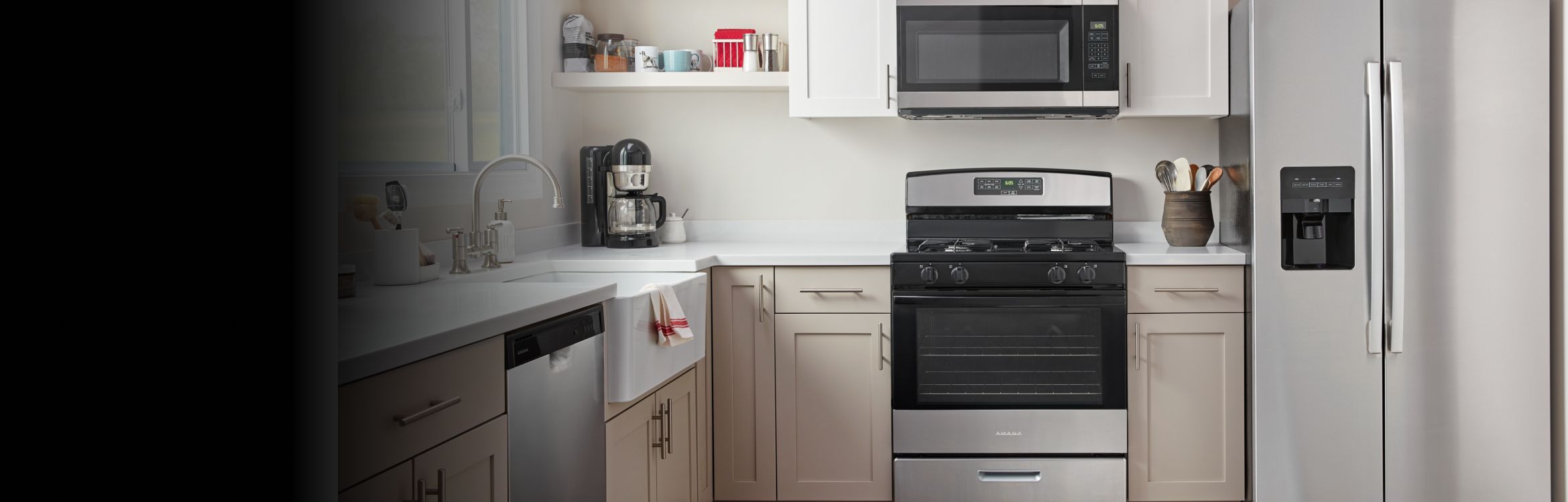 A modern kitchen with Amana® appliances.