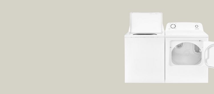 Amana® washer and dryer set with lids opened.
