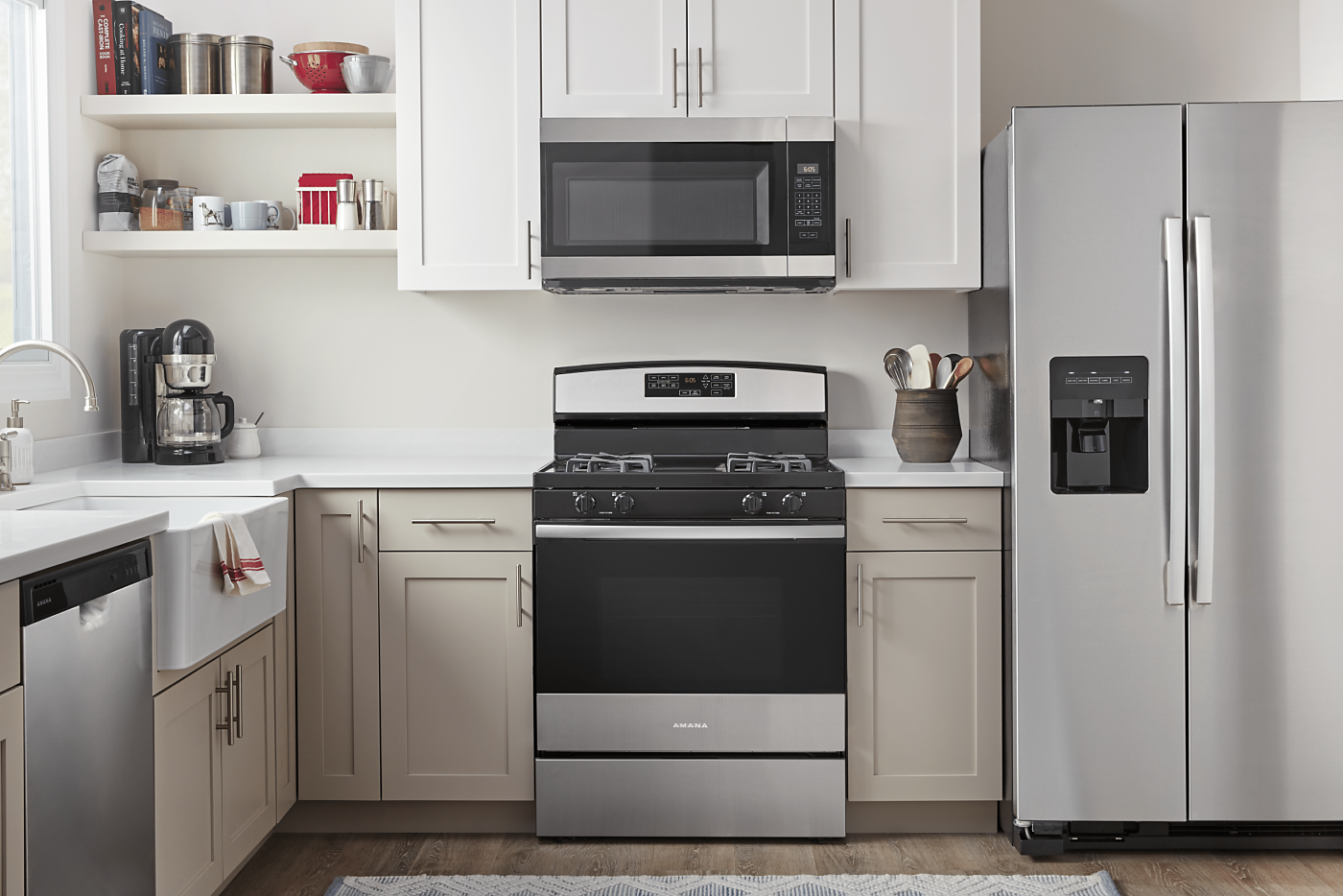  Amana® stainless steel kitchen appliances in a neutral kitchen