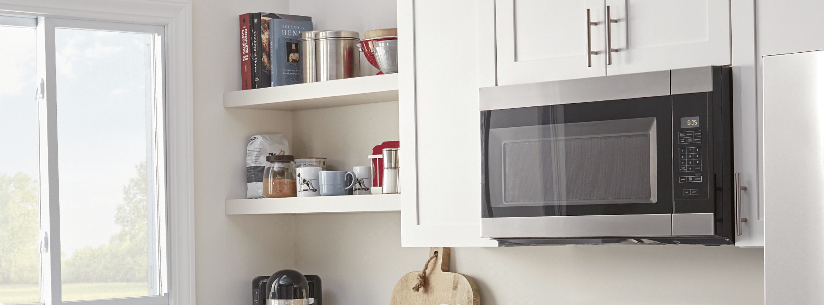 Amana® built-in microwave installed in white cabinetry
