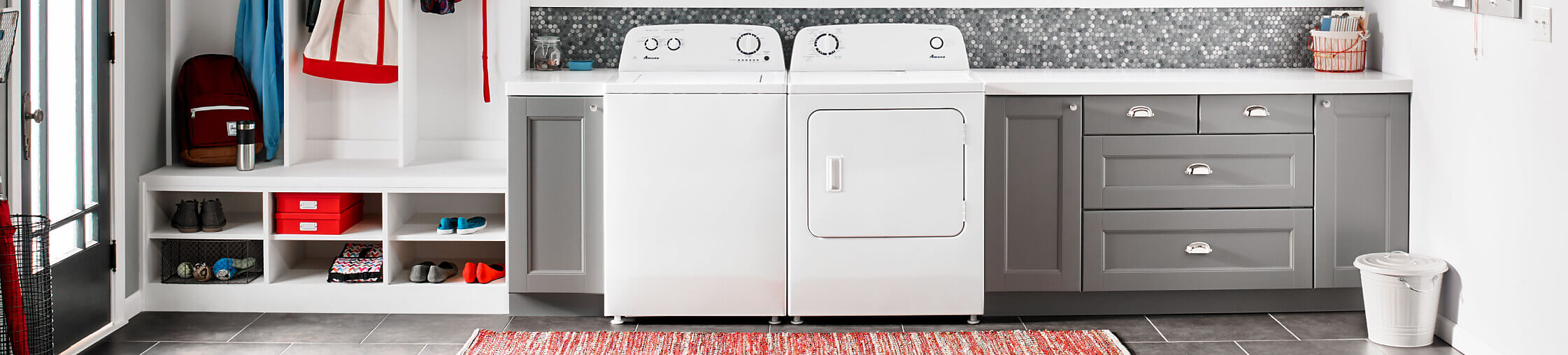 Amana® washer and dryer pair in laundry room