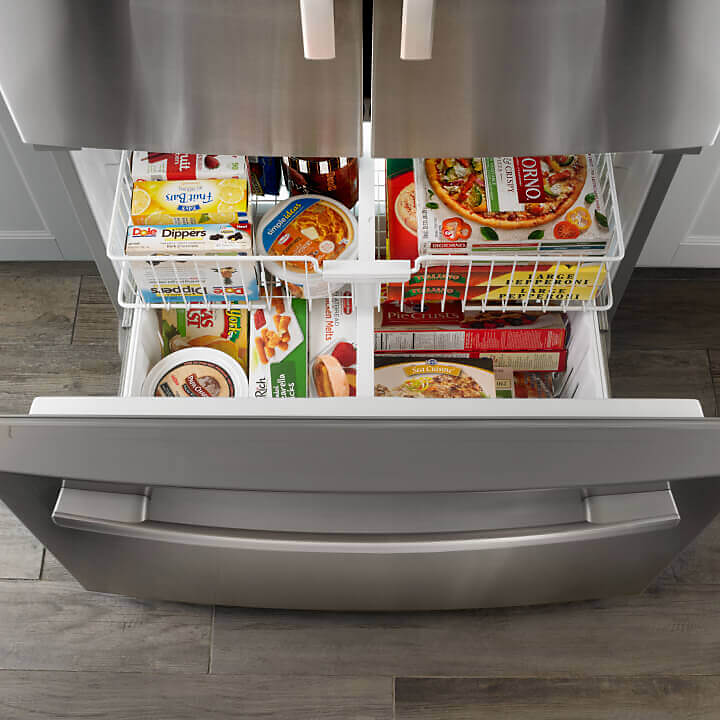 Refrigerator with bottom freezer drawer open