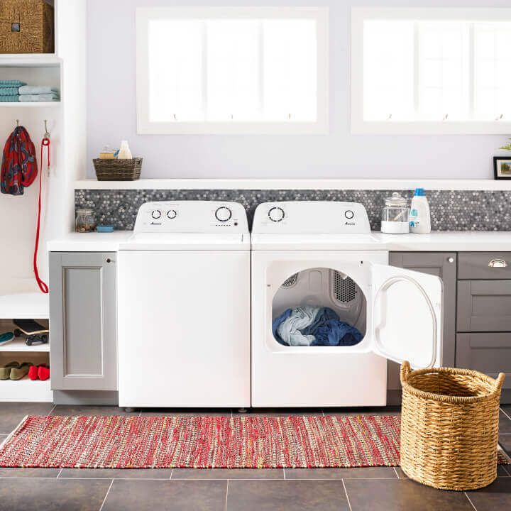 Amana® washer and dryer pair with dryer door open Amana® washer and dryer pair with dryer door open
