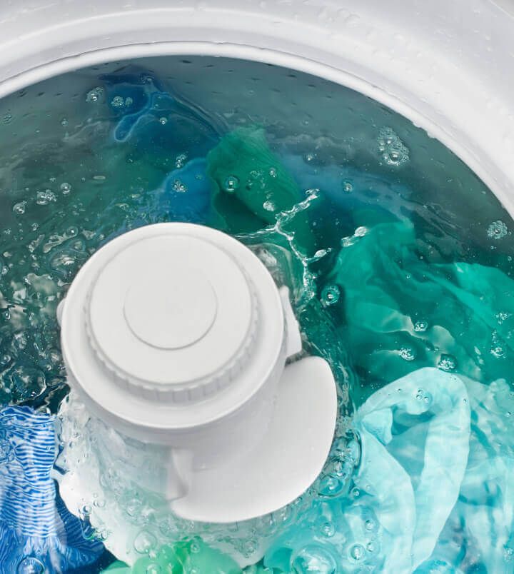 Amana® washer with clothes spinning Amana® washer with clothes spinning