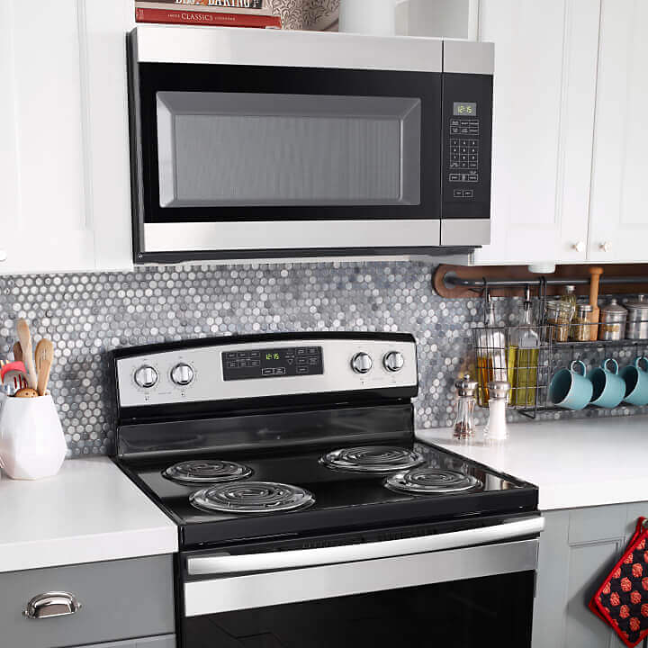 Amana® range and microwave in kitchen