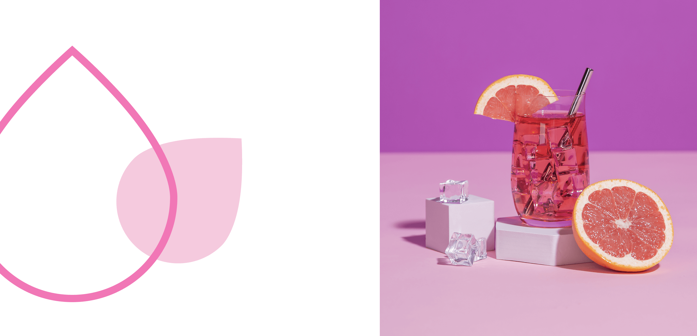 Un cocktail couleur pamplemousse vif avec une moitié de pamplemousse coupée rouge rubis.