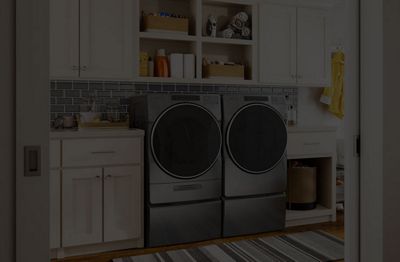An image of a laundry room with overlay text that reads 'Return Policy' and 'Learn More'.