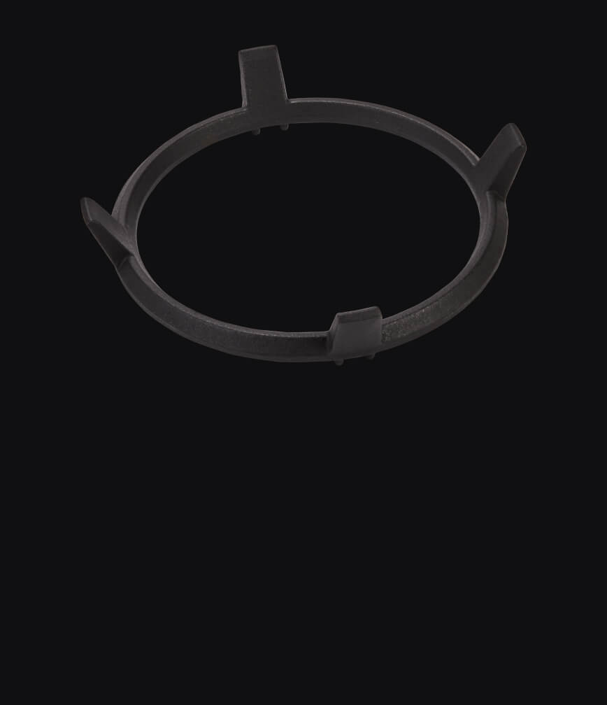 A wok ring isolated on a black background.