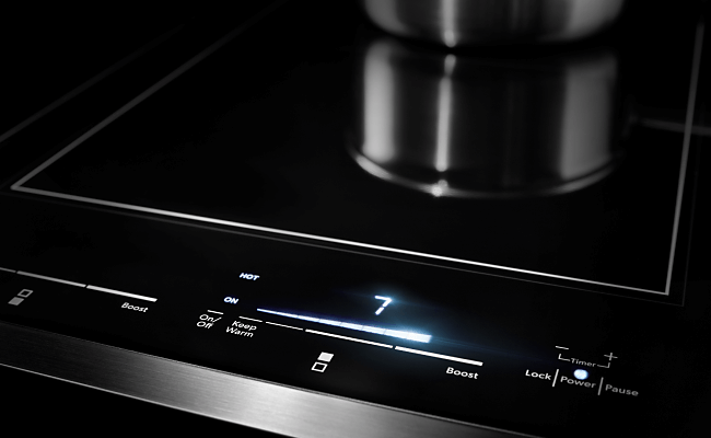 The controls on a JennAir Electric Cooktop. 