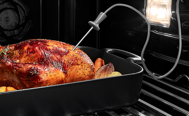The Connected Temperature Probe placed in a roasting turkey withinin a JennAir Wall Oven. 