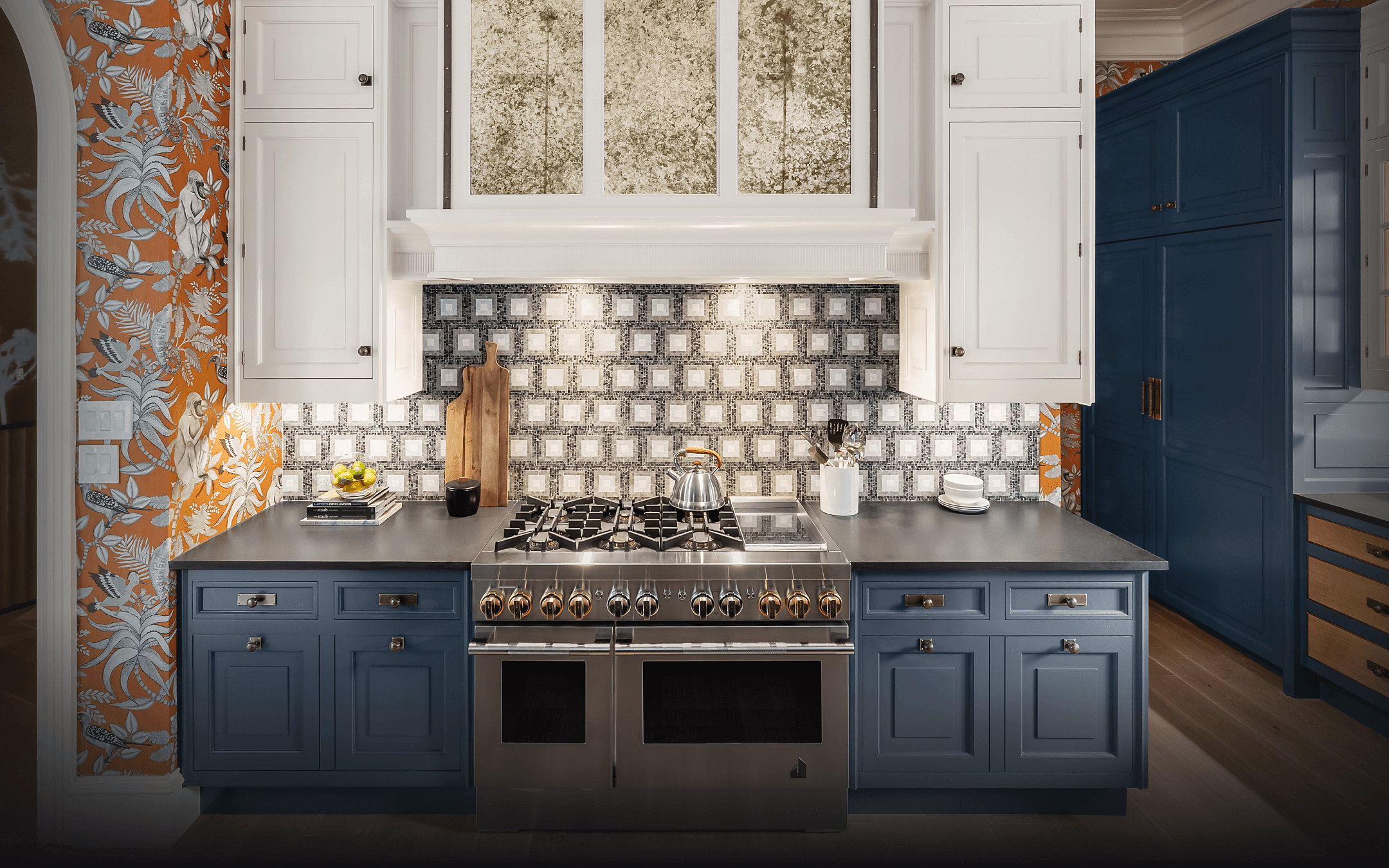  A RISE™ Professional-Style Range in a blue kitchen.
