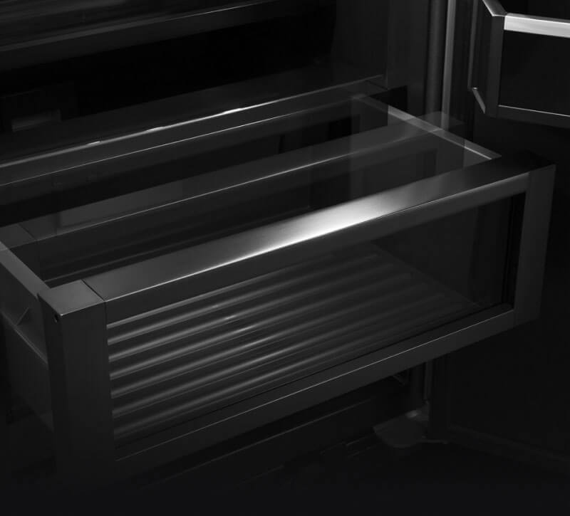 The drawers inside of a JennAir® built-in refrigerator.