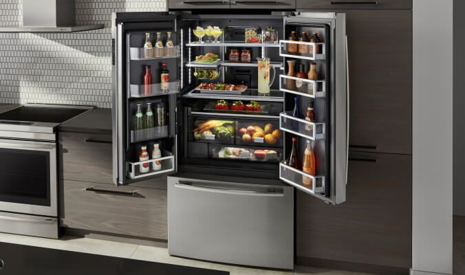 The interior of a JennAir® counter-depth freestanding refrigerator.