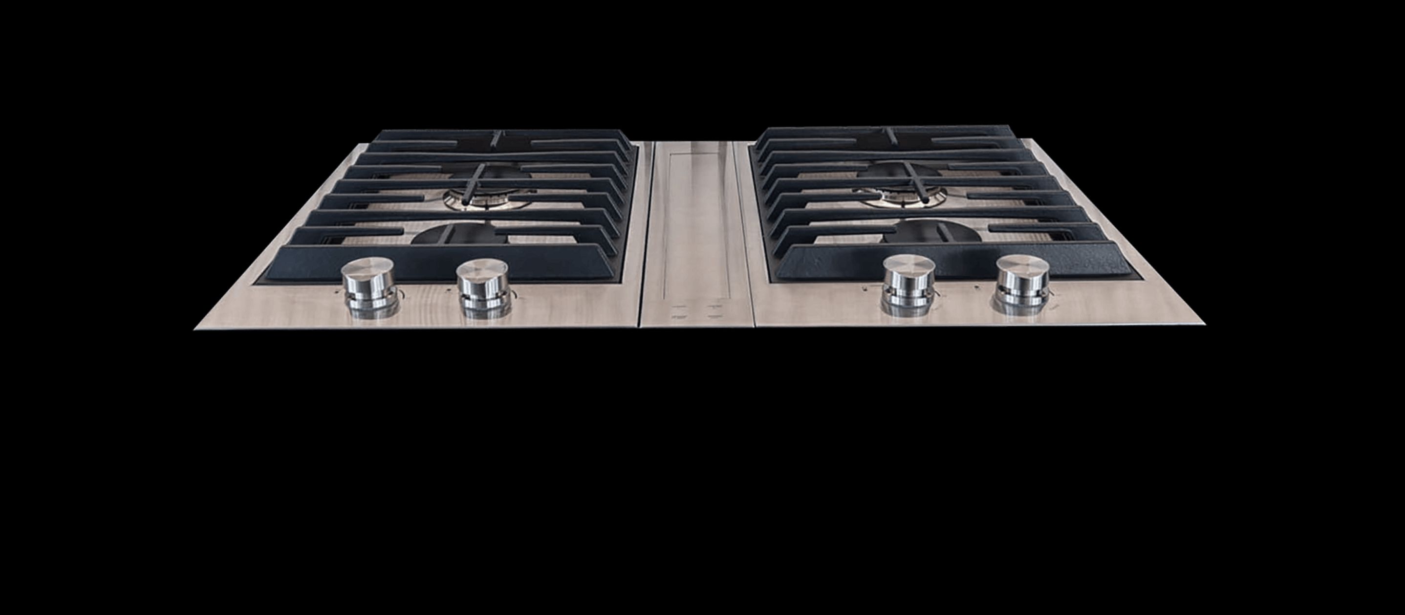 JennAir® 2-burner customized cooktops paired with a downdraft ventilation strip.