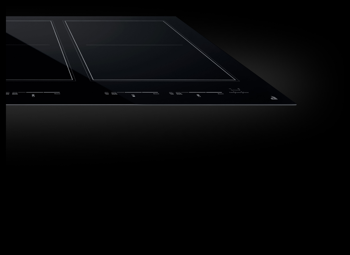 A JennAir® cooktop in Oblivion Glass.