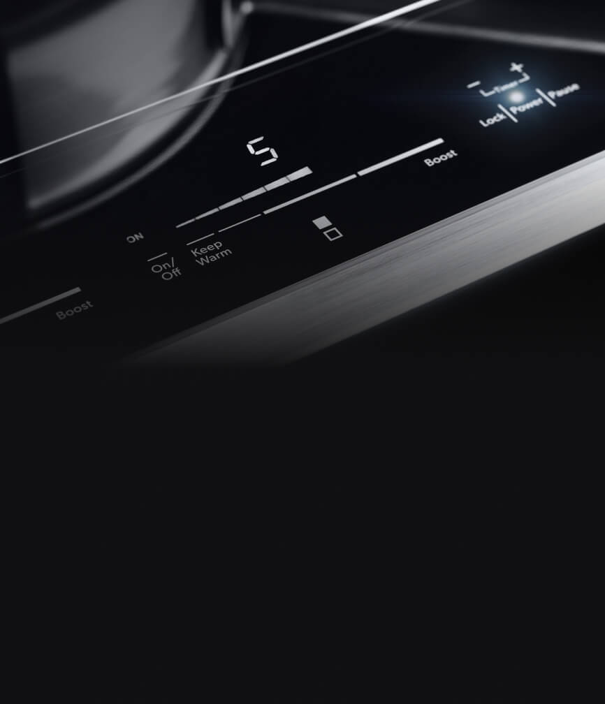 The lit controls of the 15-inch induction cooktop.