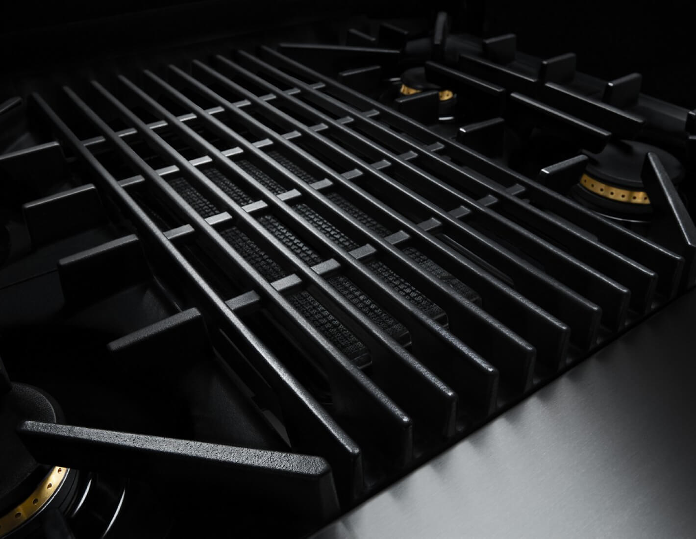 The grill on a RISE™ Design gas rangetop.