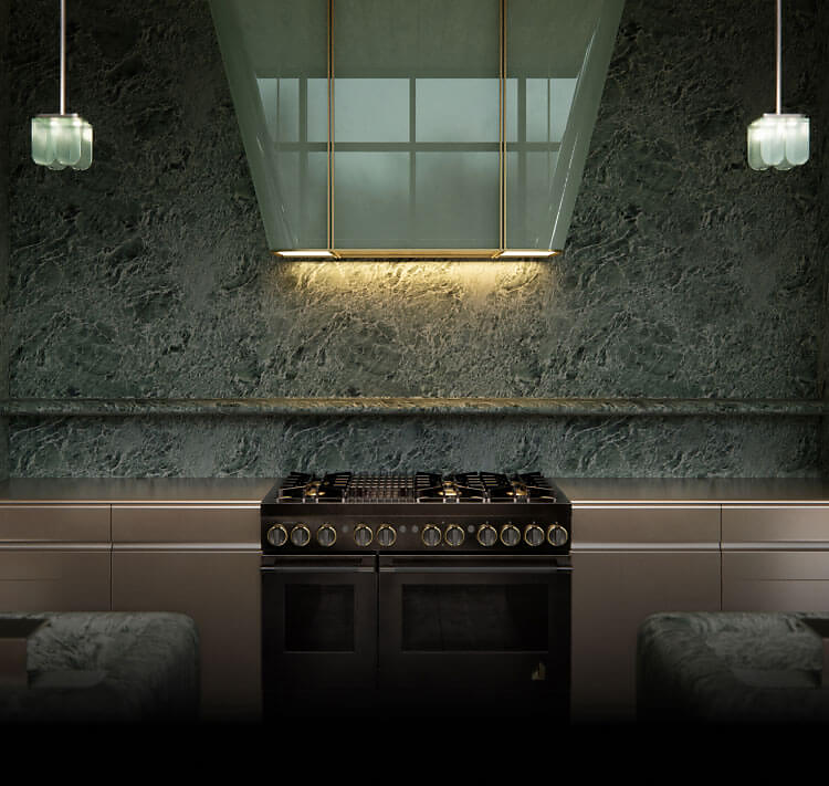 The kitchen designed by Kelly Wearstler in shades of subdued green.