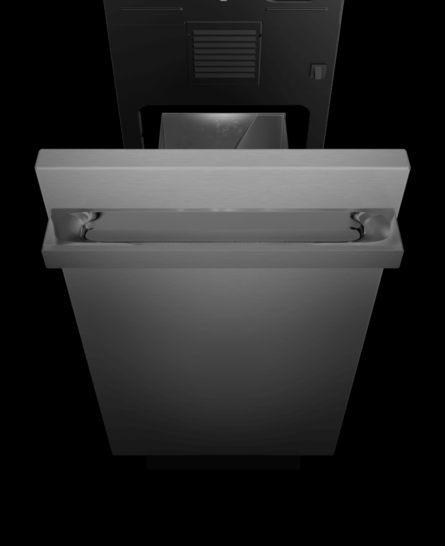 An open JennAir® Trash compactor showing the capacity.