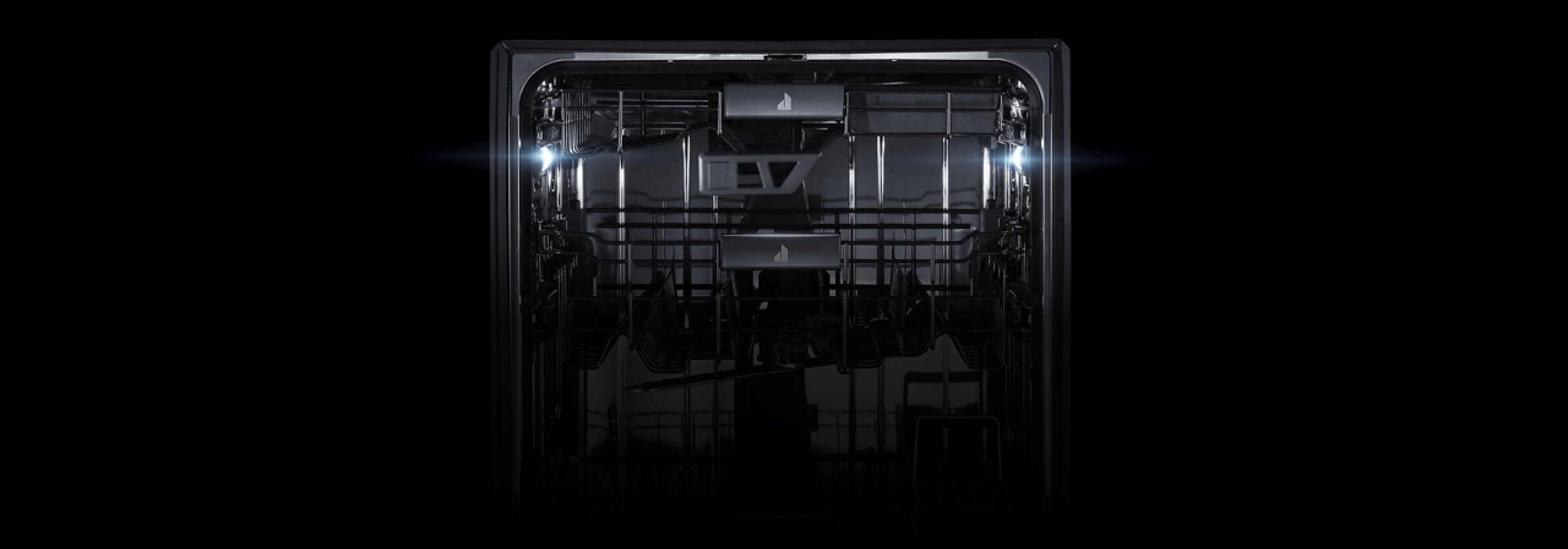 The interior of a JennAir® Dishwasher, focusing on the top two racks.