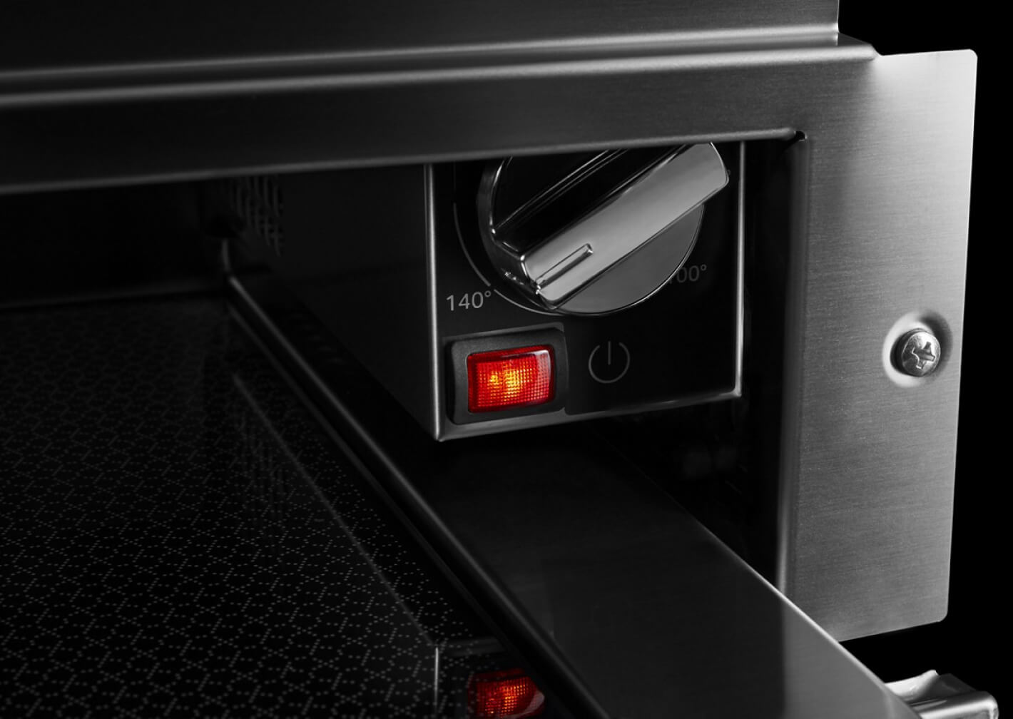 The temperature control knob in a JennAir® warming drawer.