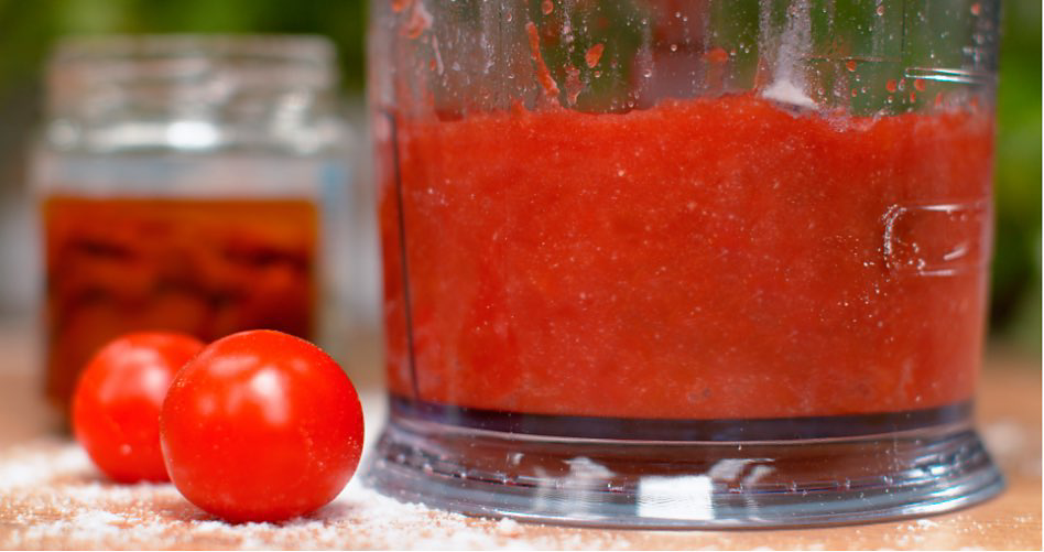 Pureed tomatoes in food processor