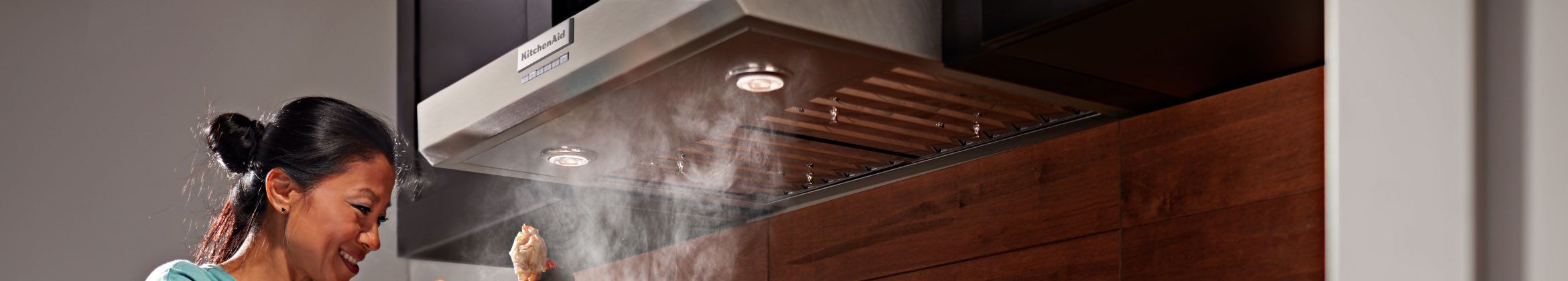 Woman cooking with a combination microwave