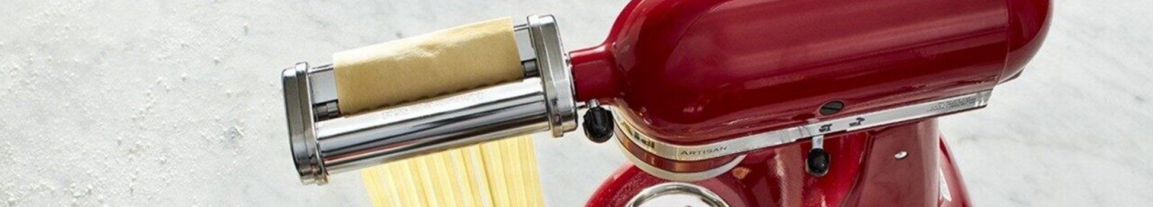 A KitchenAid Stand Mixer with Pasta Roller and Cutter Set