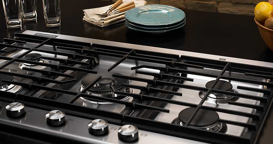Les brûleurs d'une table de cuisson au gaz.