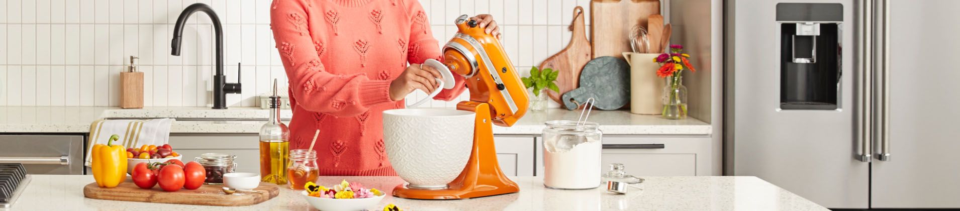 Woman using a Stand Mixer attachment