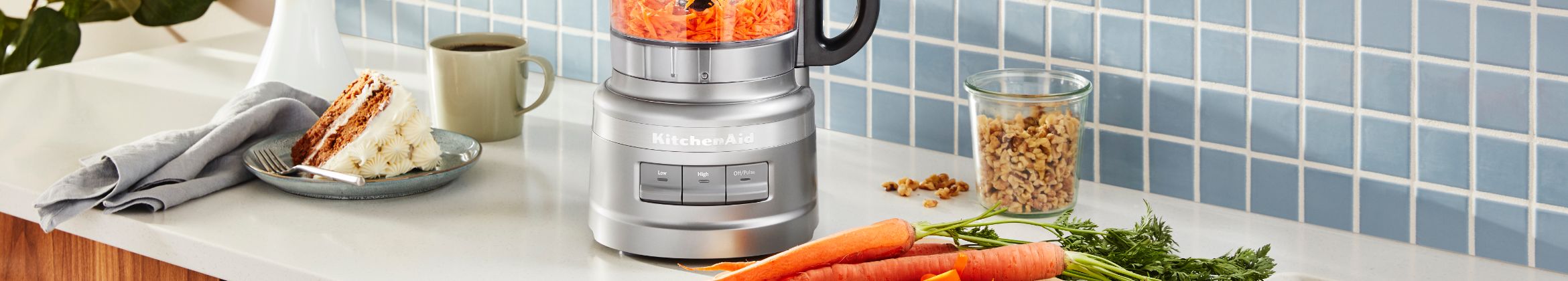 KitchenAid Silver Food Processor grinding carrots