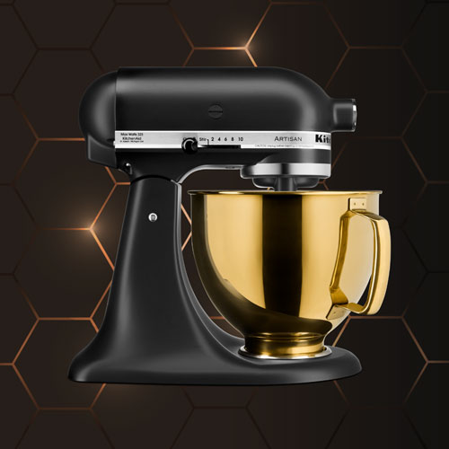 Black Stand Mixer in fornt of dark honeycomb textured background