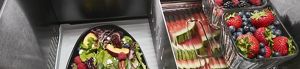 Inside of KitchenAid Refrigerator. Eggs, lemons, grapes and blueberries each in their own container.