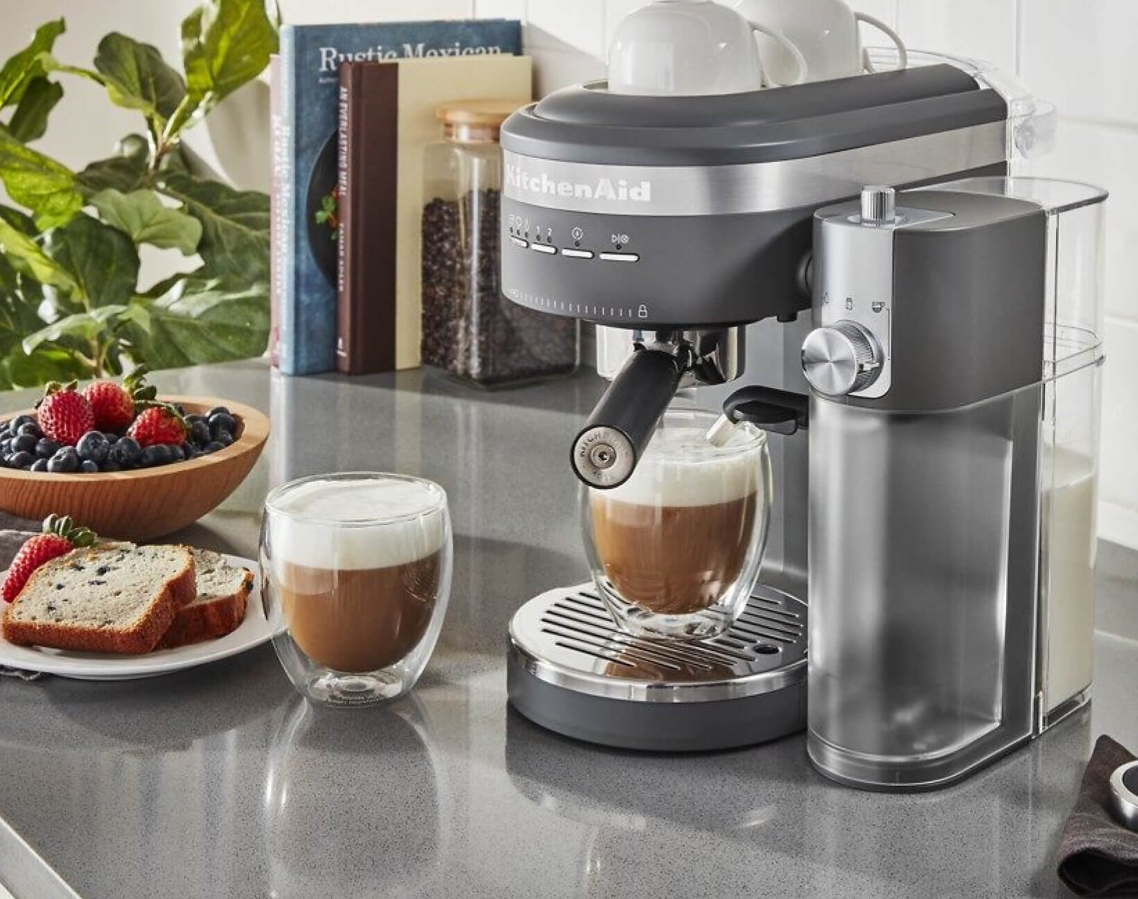 A KitchenAid® espresso machine making a cup of coffee.