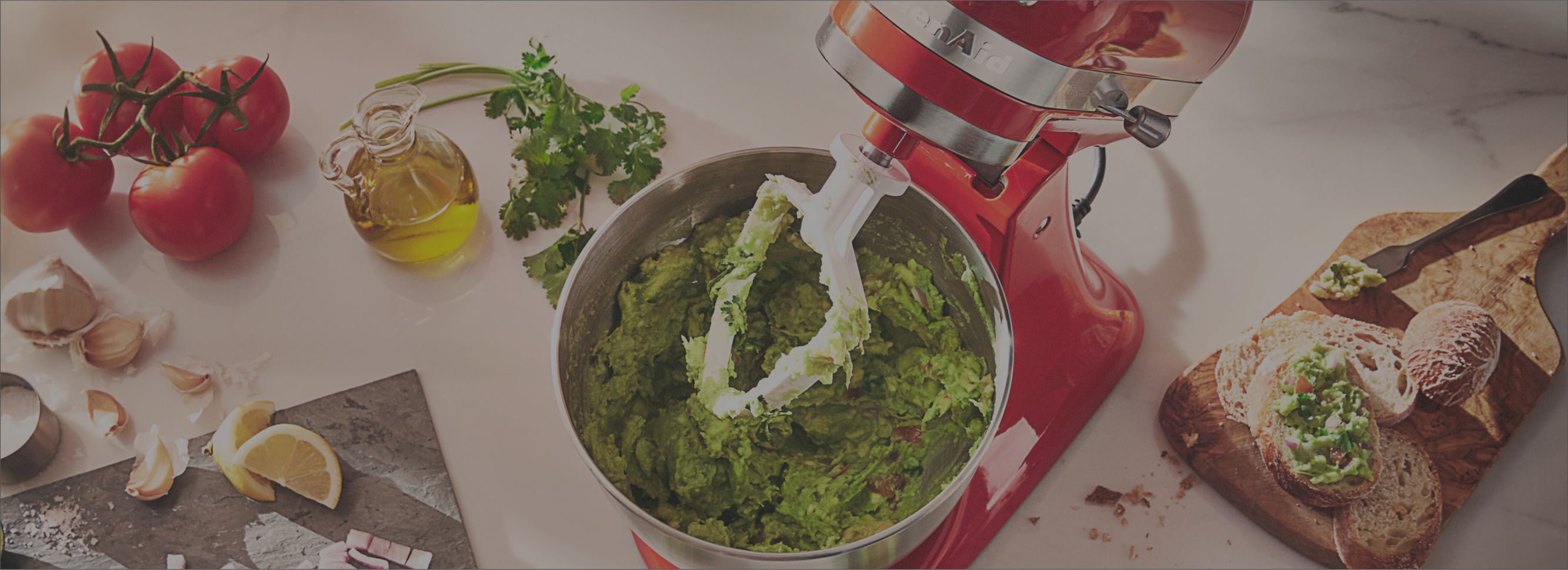 Closeup view of a KitchenAid® stand mixer in action