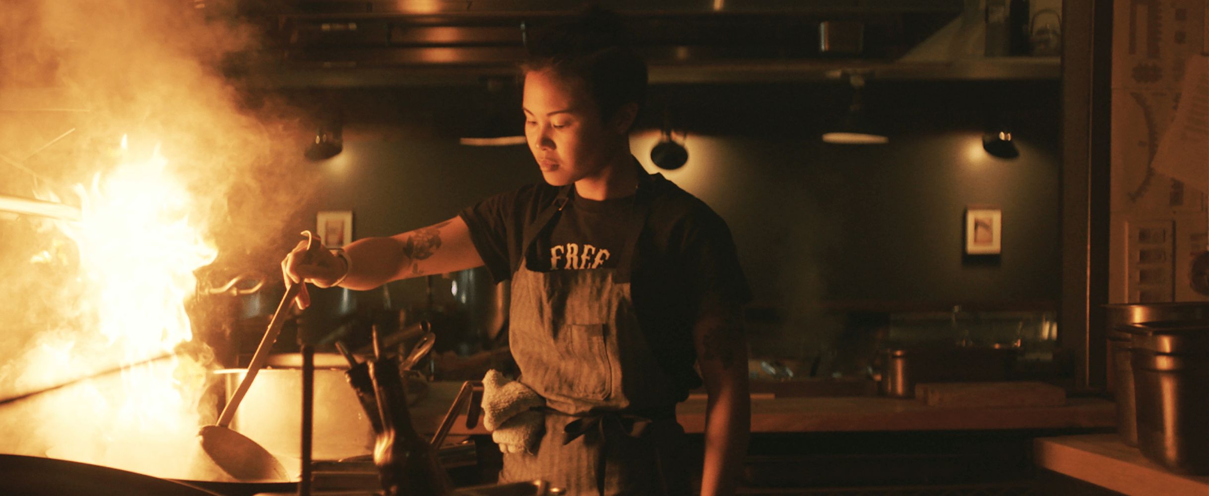 A chef working in a kitchen.