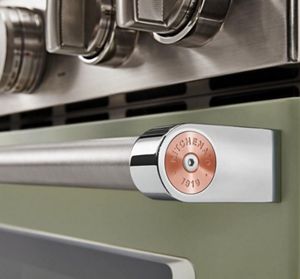 A detailed view of the handle and knobs on the KitchenAid® Avocado Cream range.