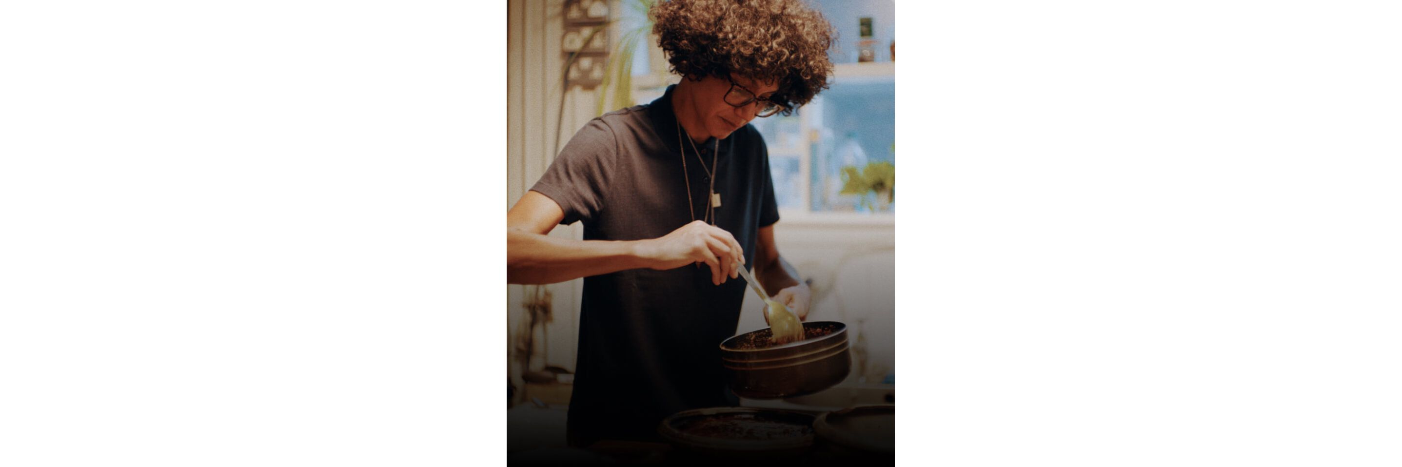 Maker Zoe Adjonyoh cooking in her kitchen.