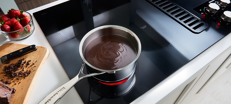 Chocolate melting on a downdraft electric cooktop