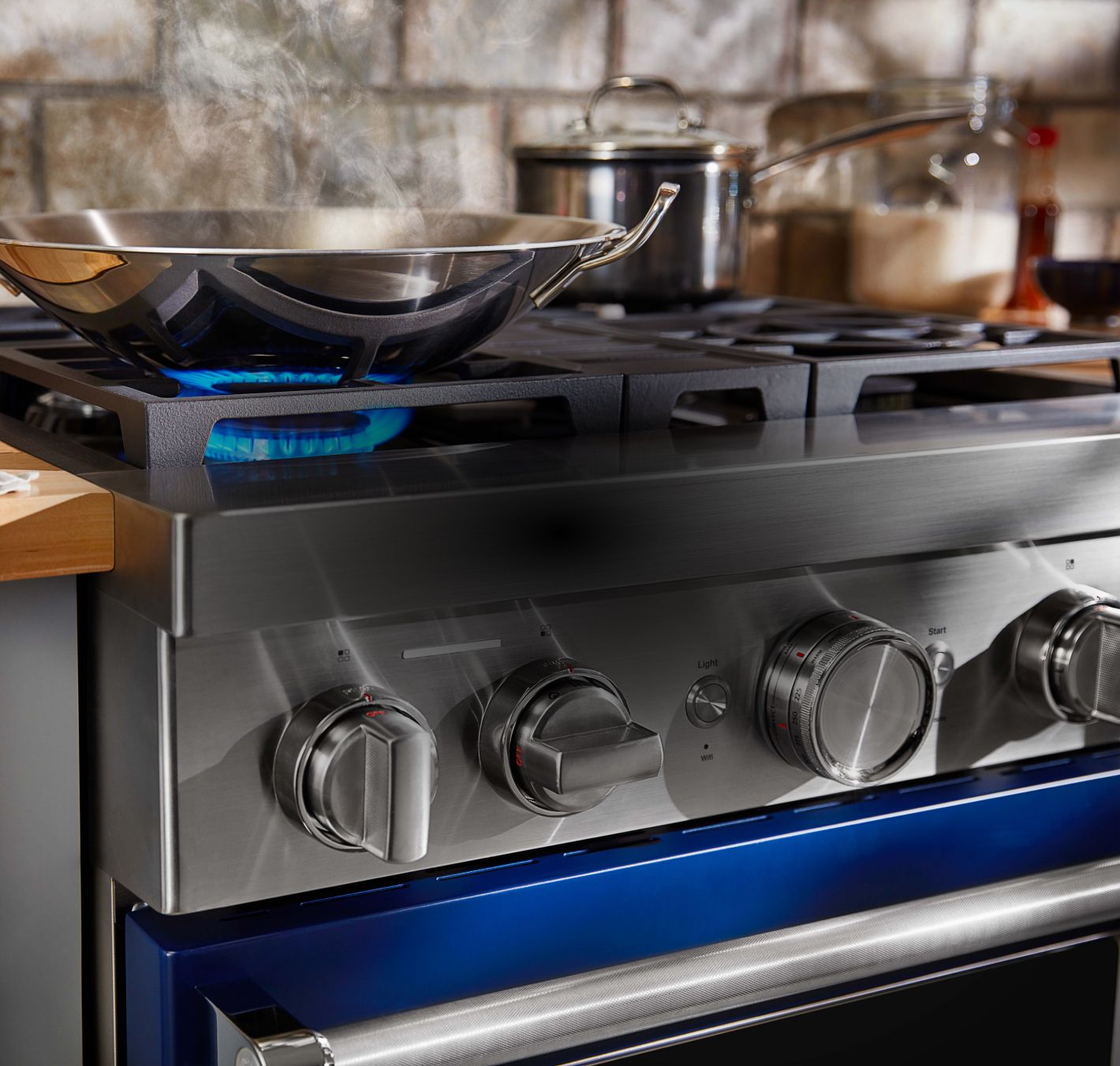 Close up of blue commercial-style gas range