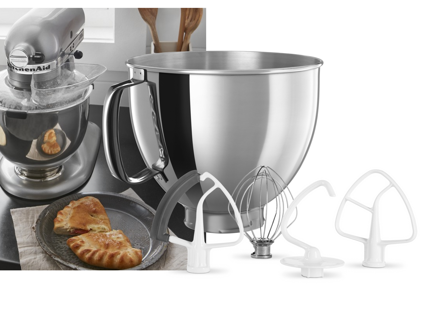 A stainless steel bowl, edge beater, whip, dough hook, flat beater, spiral hook and pastry beater.