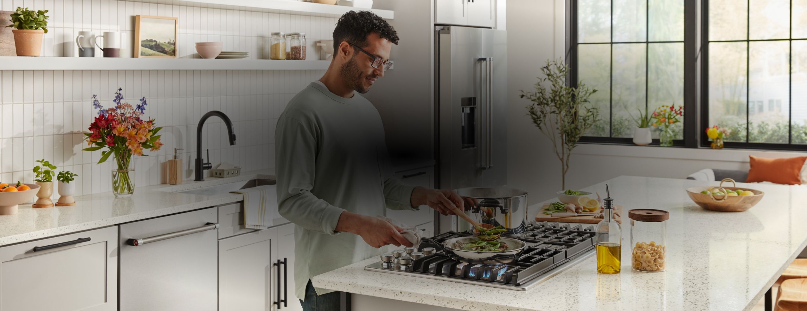Cooking on a KitchenAid® range.