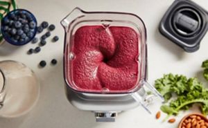 A Blender making a smoothie.