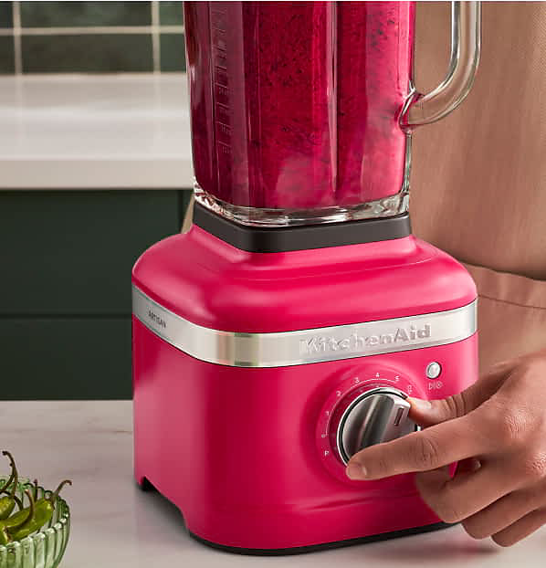 A K400 Speed Blender in Hibiscus blending hibiscus with other fruits.