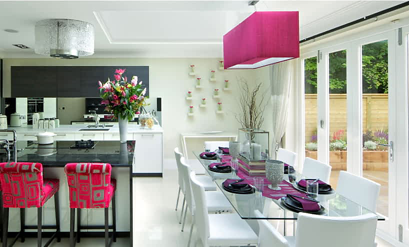A bright kitchen with hibiscus accents.
