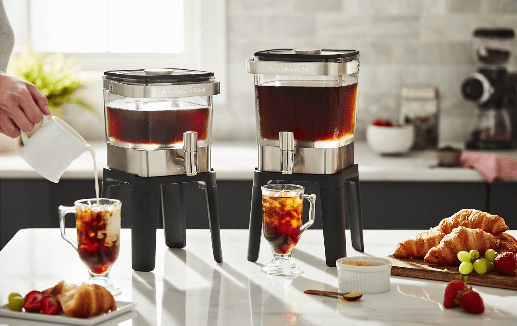 Two KitchenAid® Cold Brew Coffee Makers on a bright white counter.