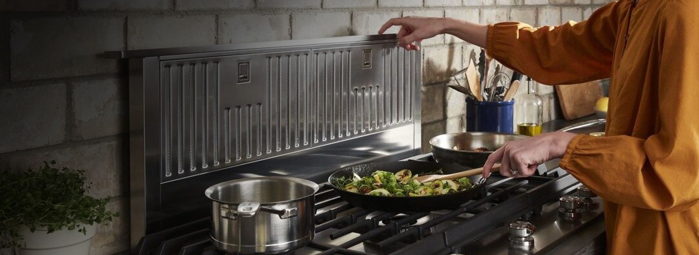 Cooking on a KitchenAid® range.