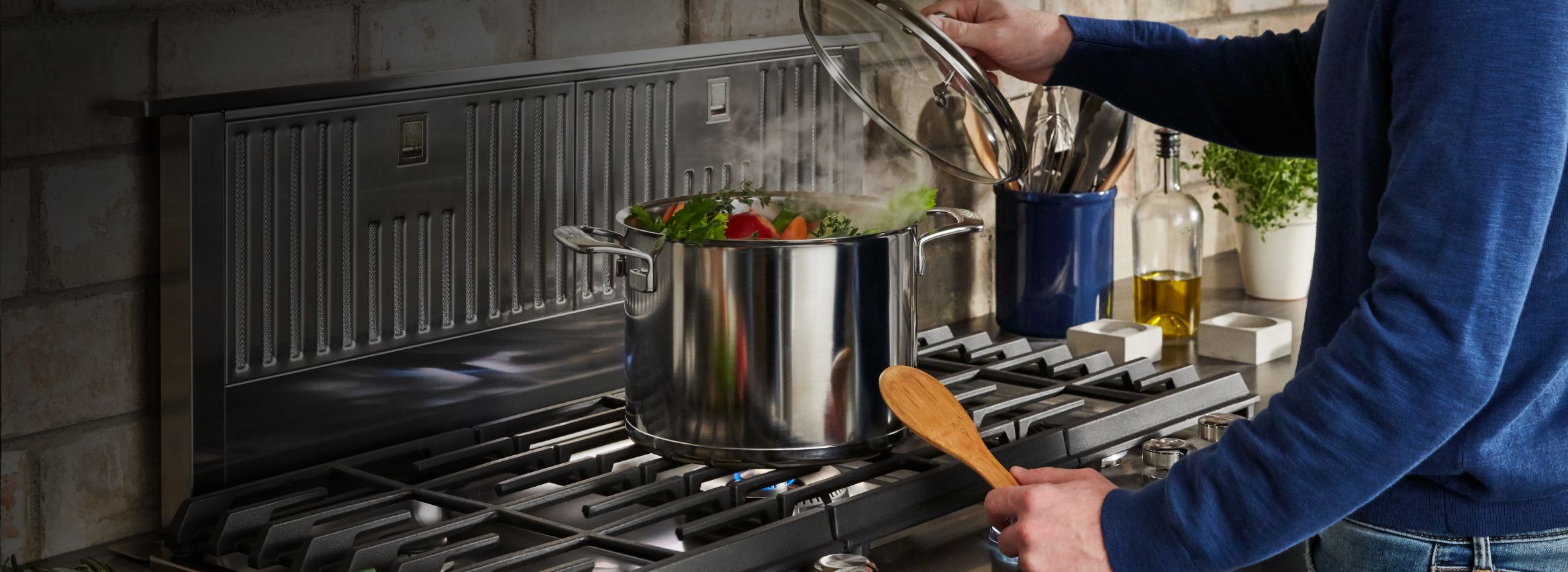 Cooking on a KitchenAid® range.