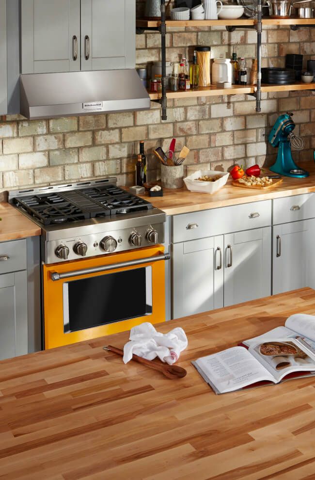 A clean kitchen with KitchenAid® appliances.