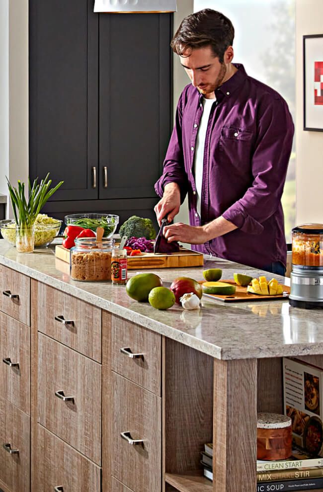 A person chopping vegetables